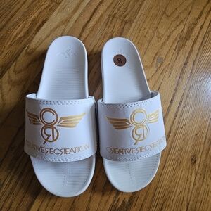 Creative Recreation White Slides with Gold Accents